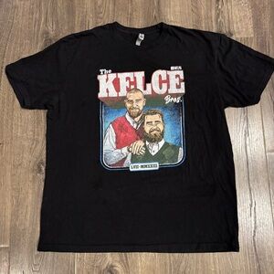 NFLPA Black Kelce Bros Graphic Tee size XL (small hole on right sleeve)